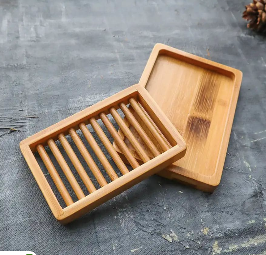 Wooden soap dish on a gray surface